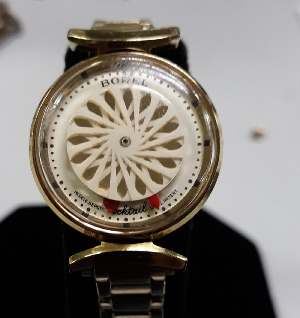 Ernest Borel 1960's Cocktail white flower watch: this is an iconic watch by Ernest borel cocktail watch stem missing has crown very good condition some scratches on crystal spiedel band is very nice too! see pics