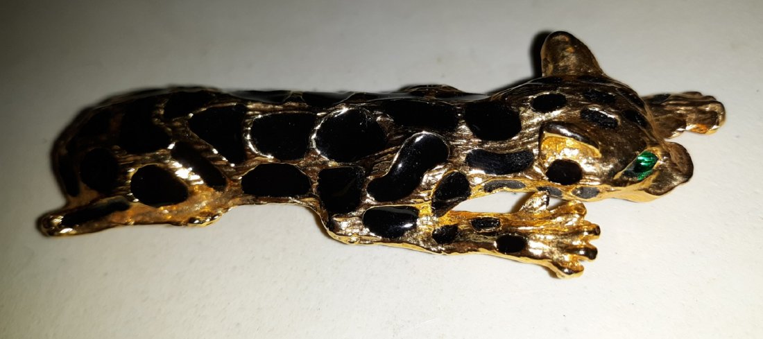 Large Leopard Pin Emerald color Eye Nice! 4": from estate vintage leopard pin can be worn on a chain too gold tone black enamel and emerald green color eyes! 4" beautiful!
