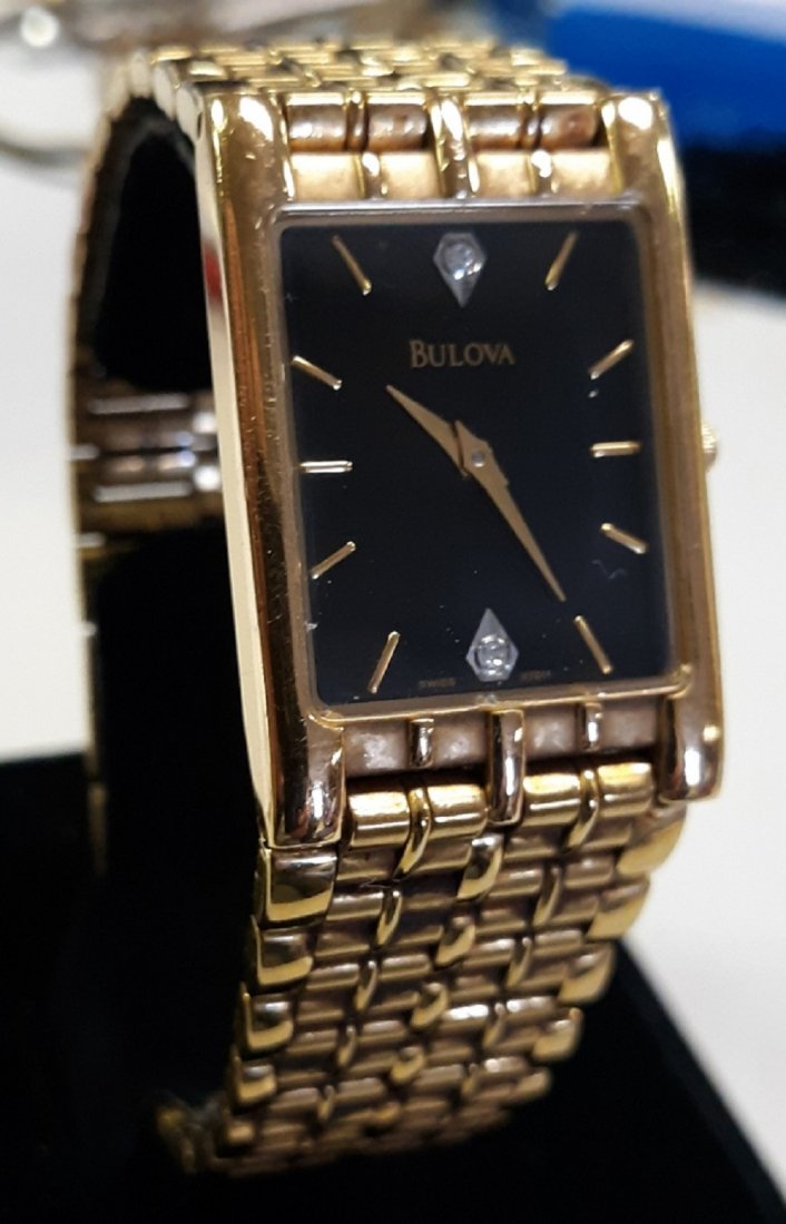 bulova diamond quartz watch Estate!: nice estate bulova watch swiss 97D11 dial double diamond dial needs battery in very good condition! see pics