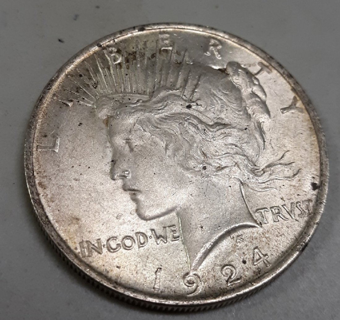 peace silver dollar us coin 1924 AU!: beautiful 1924 peace silver dollar AU+? check out the pics you decide the grade! light toning and spotting see pics