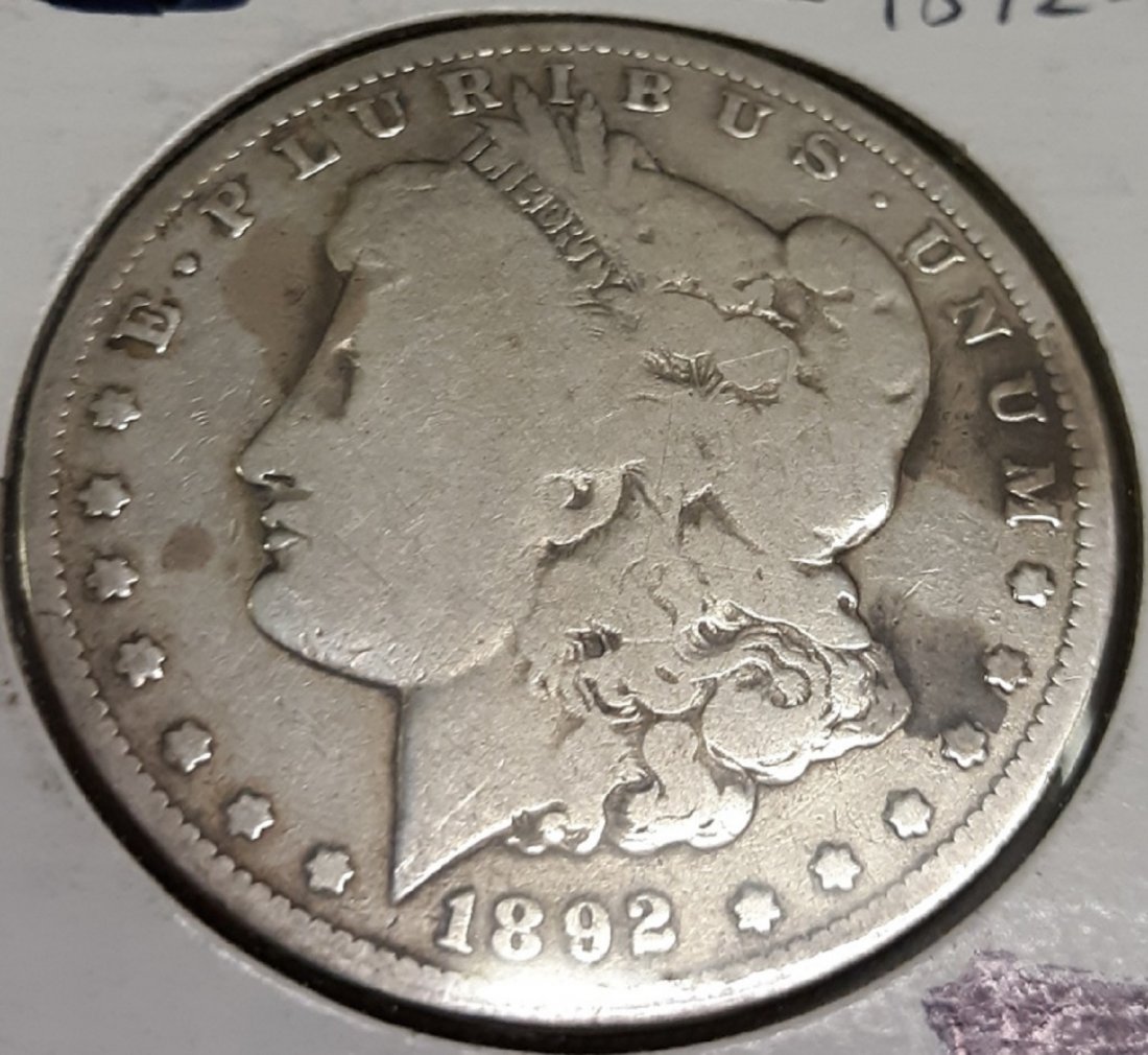 Morgan silver Dollar us coin 1892 O nice!: From estate collection nice 1892 O morgan silver dollar us coin. check out the pics you decide the grade silver is on the rise so don;t miss out!