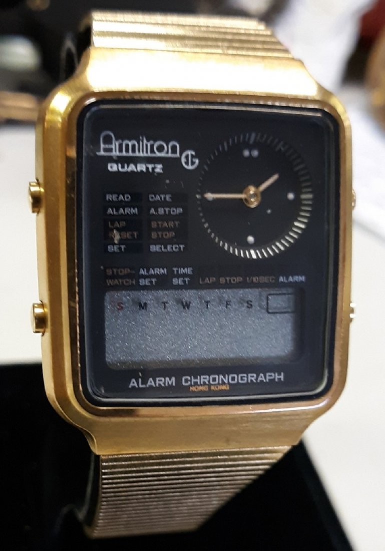 rare armitron quartz alarm chrono watch 20,3100 mint!: this watch is in pristine condition appears unworn! digital and analog w/alarm, lap timer etc. does need a battery 20,3100 see pics