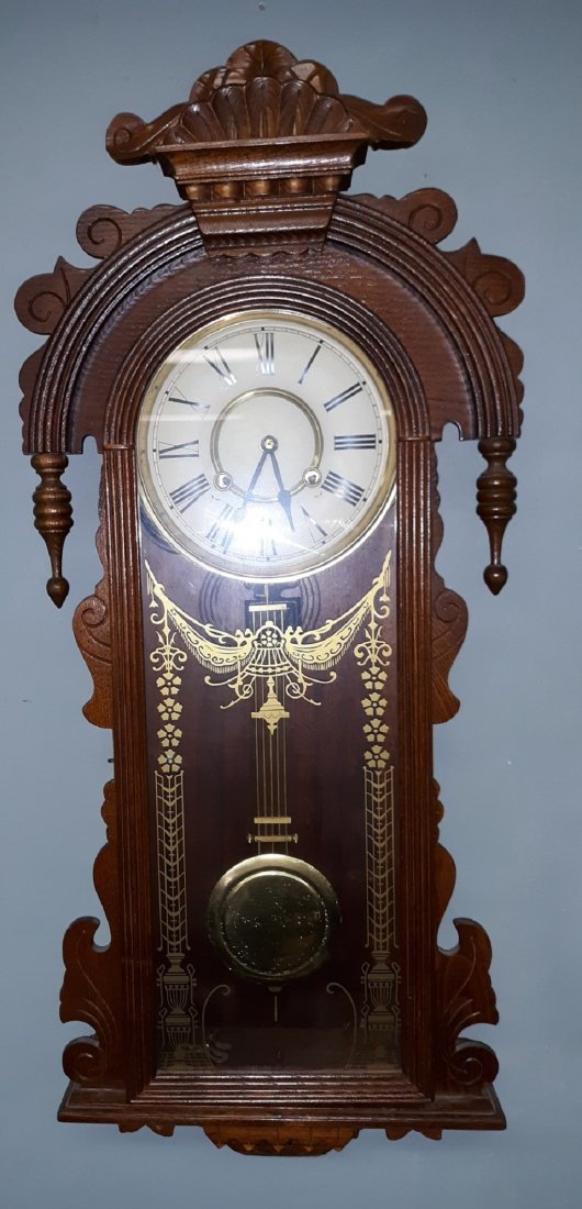 Beautiful Vintage Oak Key wind time & strike wall clock: beautiful vintage oak wall clock, time and strike 37: long 15" wide in exc condition but needs a spring repair or replaced not working made in korea cabinet is beautiful! see pics
