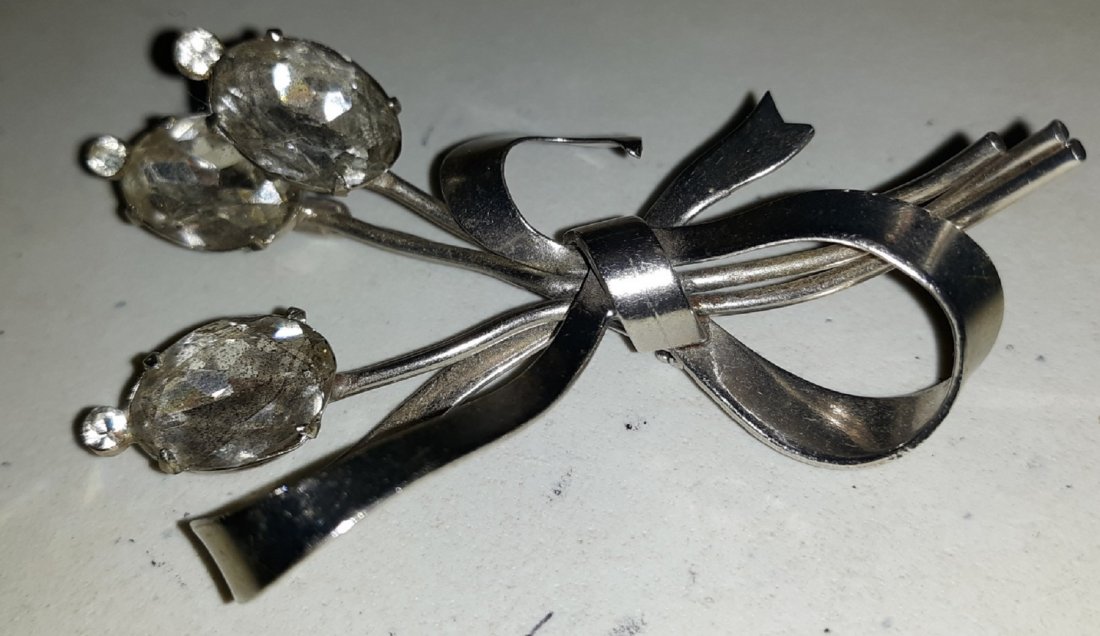 gorgeous vintage coro rhinestone brooch ribbon style: from estate beautiful coro signed foil back rhinestone ribbon brooch in beautiful cond. 2 3/4" long see pics