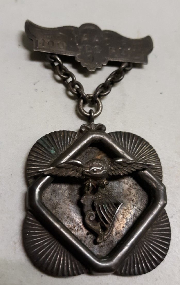 antique 1891 sterling I.A.A.C 100 yard run medal rare!: very rare 1891 I.A.A.C 100 yd run medal in sterling by r stoll ny beautiful condition but clip holder is broken see pics 3 1/4" x 1 5/8" see pic