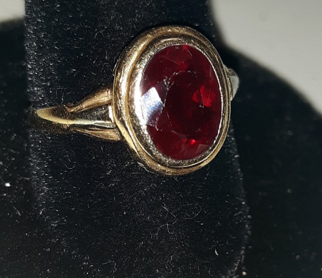 Beautiful 14K and Ruby Ring sz 7 estate item: beautiful ring has been cut on bottom but can be worn as is or have your jeweler repair it, stone has expected scratches and tiny teeny chip but look gorgeous on! sz 7 marked 14K see pics