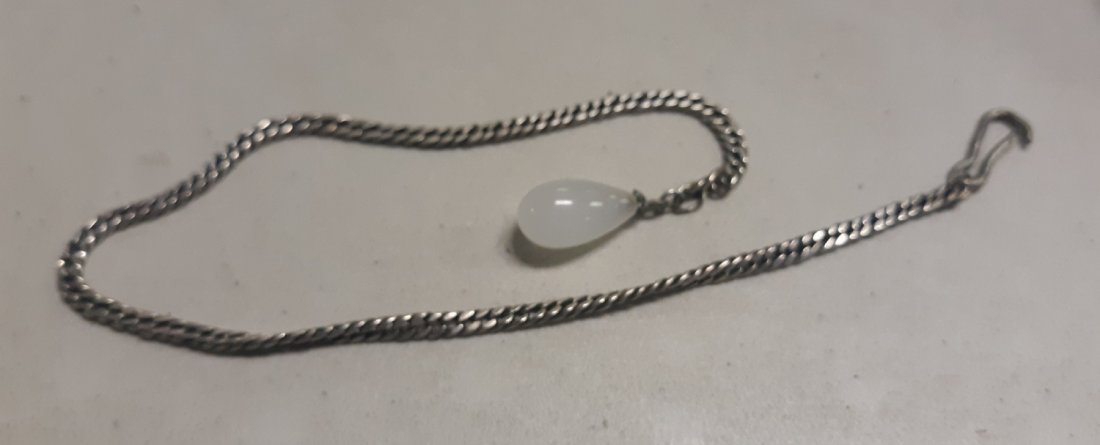 sterling silver pocket watch chain w/beaded end: nice chain from estate marked sterling 11" long clip end is a little loose but easy to replace clasp see pics maybe moon stone bead?