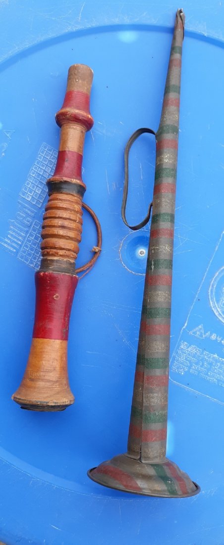 antique toy bugles tin lithograph & wood Czech lot of 2: from estate collector 1 is tin litho from germany 12 3/4" and 1 is wood carved from czecho slovakia 9" handle is a little loose both for 1 bid see pics