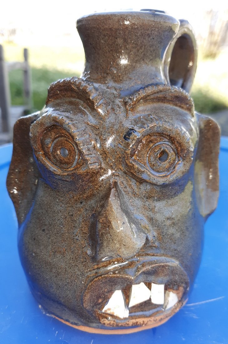 Marly & Stanley Ferguson Pottery face jug 5 1/2": from estate collection blue gray glaze inset eyes 4 teeth crooked nose, as made signed and dated 9/11/2018 5 1/2" tall see pics
