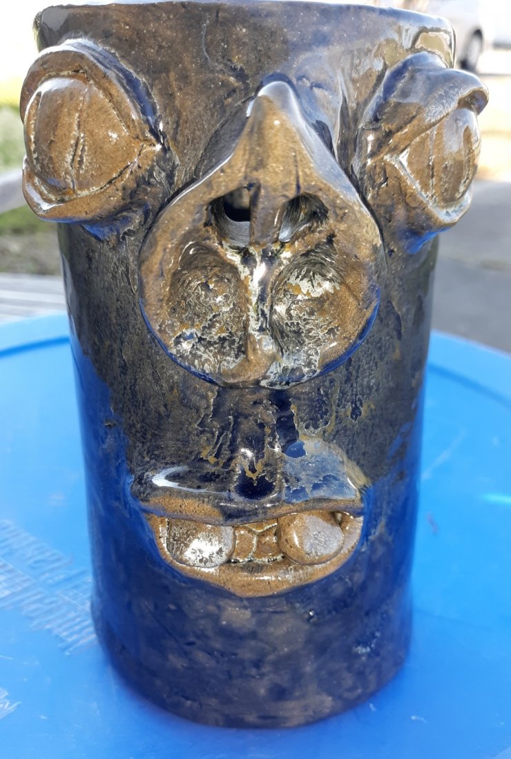Crazy Pig Face Pottery Pitcher awesome!: from estate nose is the spout for pouring steel blue glaze 6 1/2" tall no damage noted see pics