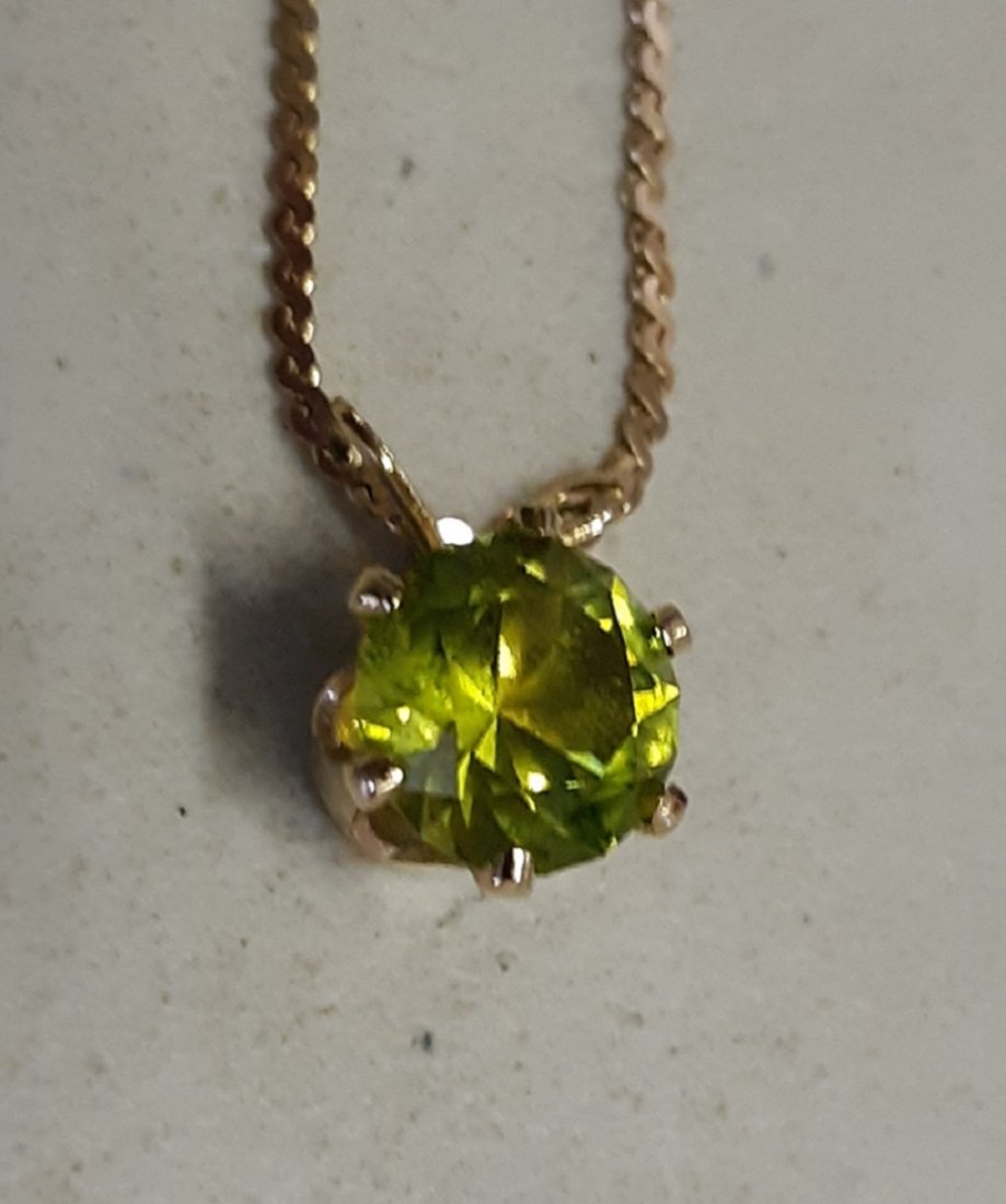 Necklace 14K & peridot? 15" estate item: beautiful estate jewelry necklace w/approx 2 carat peridot? not sure if man made or natural? marked on pendant? chain is marked 14K gorgeous see pics