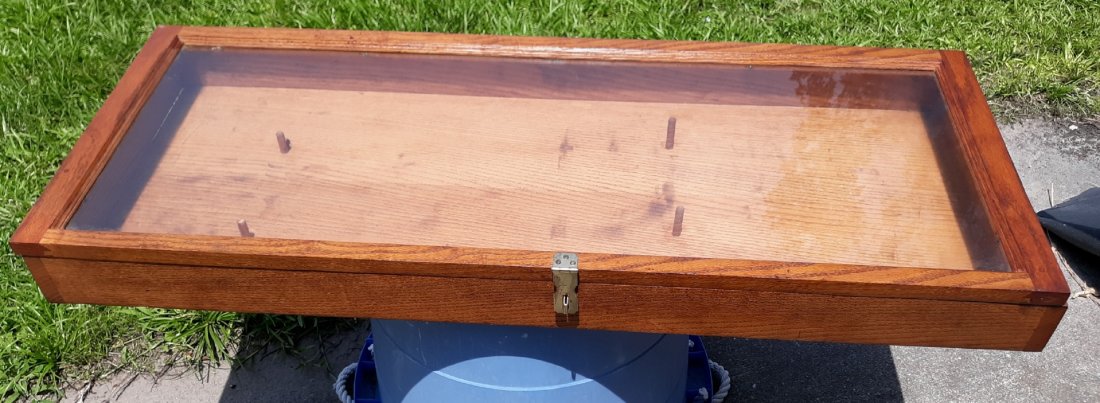 antique oak rifle display case beautiful!: gorgeous solid antique oak display case used for 2 rifles but could be used for any collectibles, 1 small chip in glass pictured but said to have been there a long time 42 1/2" wide 17" by 3 3/4" see 