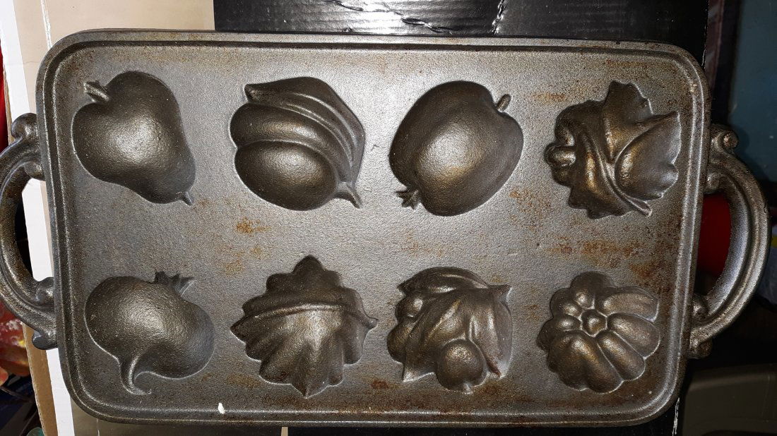 John Wright Cast Iron Candy baking Mold: John Wright Cast Iron Candy baking Mold 15" long from handle to handle very good used condition see pics