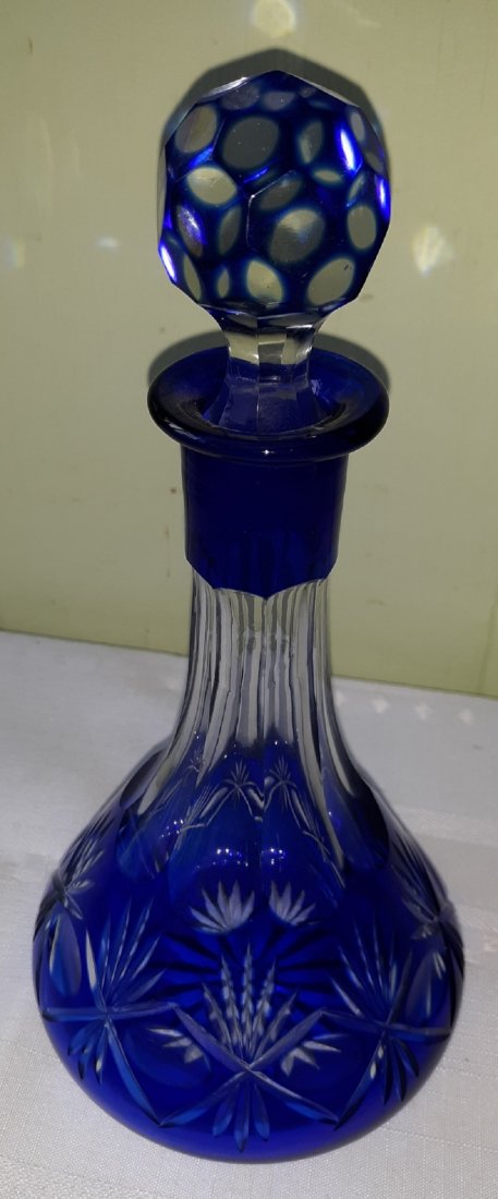 vintage bohemian cobalt cut to clear bottle w/stopper: from estate beautiful cobalt blue cut to clear bohemian glass stopper damage but not seen displayed 9 1/2" tall see pics