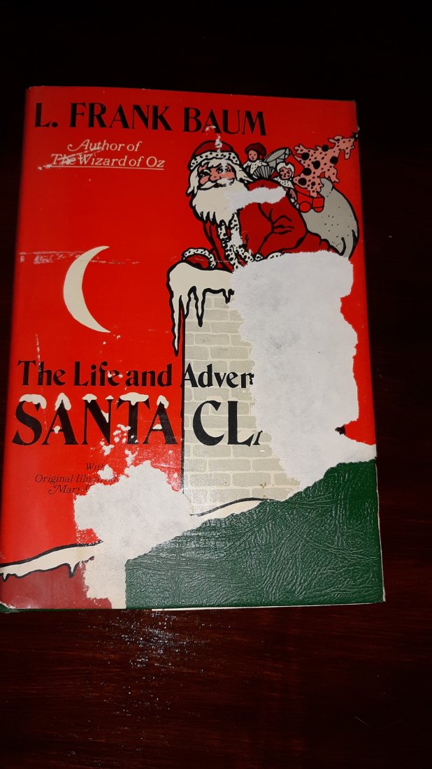 the Life and Adventures of Santa Claus by L Frank Baum: the Life and Adventures of Santa Claus by L Frank Baum author of the wizard of oz book. conditon the dust jacket is ripped, the book is good condition pgs are not ripped or torn. 1971 second edition s