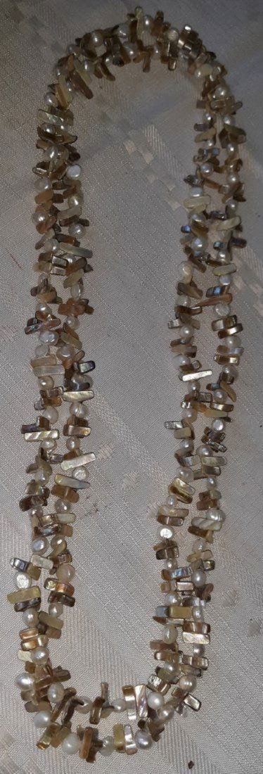 necklace freshwater pearls & abalone MOP 54": necklace 54" long with real freshwater pearls, mother of pearl or abalone? beautiful used conditon see pics