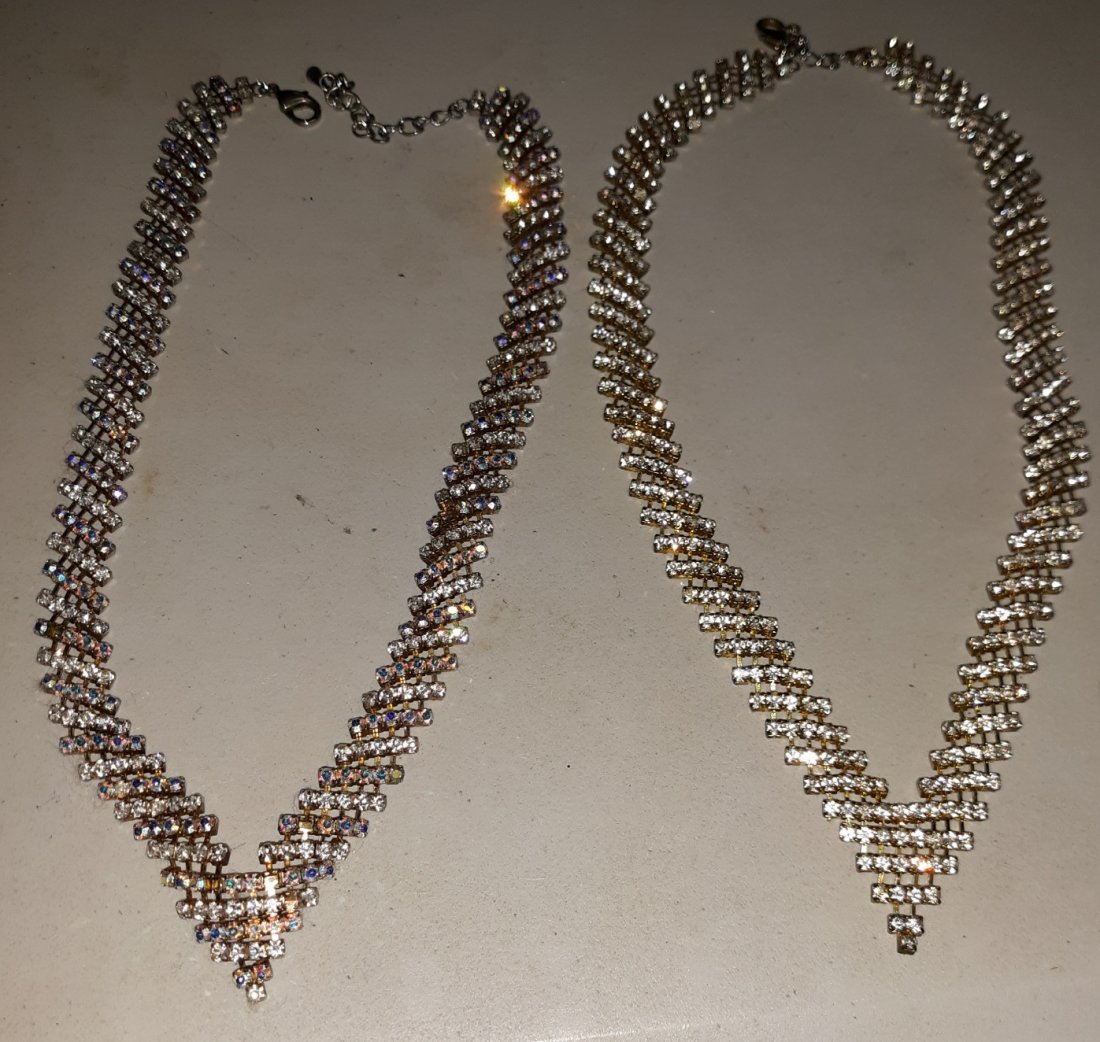 pair of vintage V shaped rhinestone choker necklaces: both have prong set stones the left necklace is missing a few stones but looks great none noticed on other 17 1/2" and 19" see pics both for one bid!