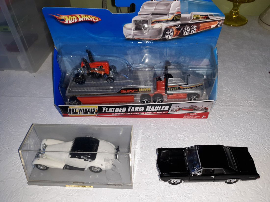 GTO 1965, 39 mercedes, flatbed hauler hot wheels: near mint 65 gto by welly, 1939 mercedes 540K and new in box hot wheels hauler with farm tractor!all for one bid! see pics
