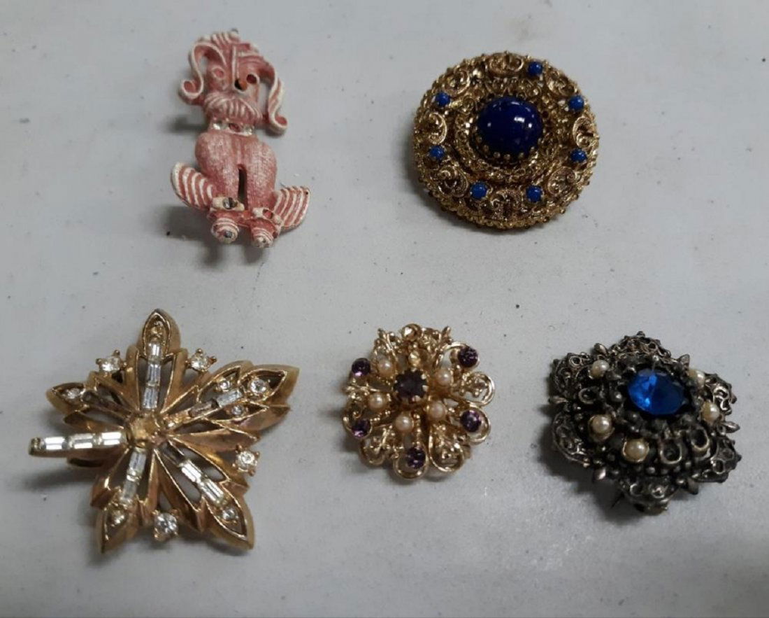 Brooches Vintage Austria, Coro, Trifari Too! Estate Lot: Brooches Vintage Austria, Coro, Trifari Too! Estate Lotnice estate lot of brooches some may be missing a stone or two but still look gorgeous on! all 5 for one bid! see pics CHECK OUT THE POODLE