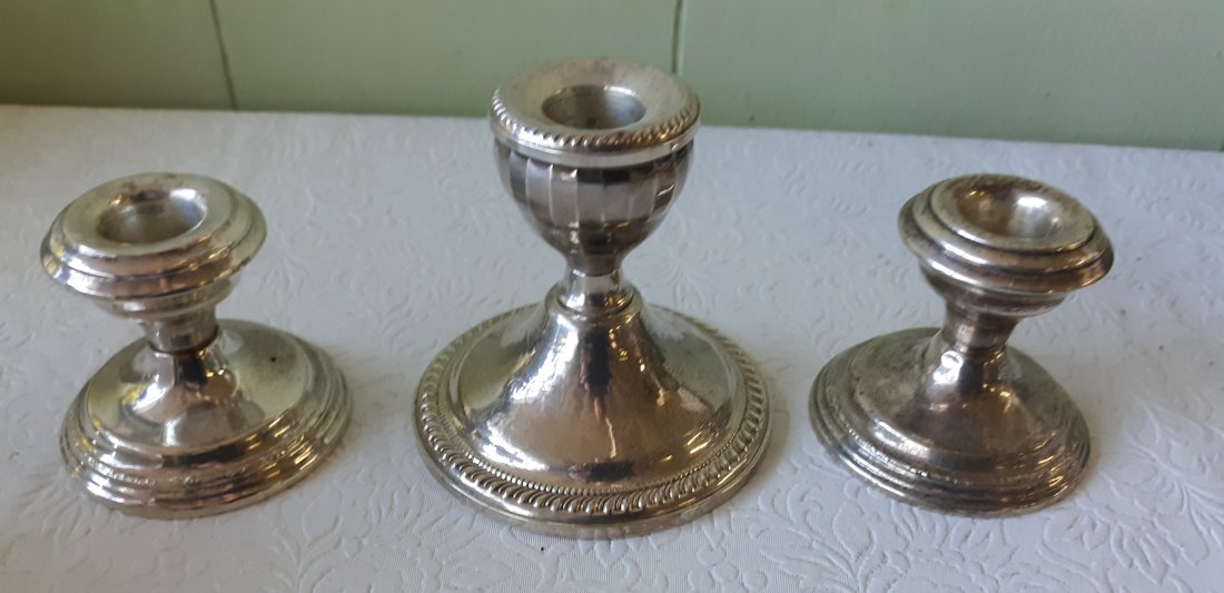 sterling candle holders lot of 3 NS co & Douchin: all 3 are sterling silver some light dents but still very useable see pics482 grams