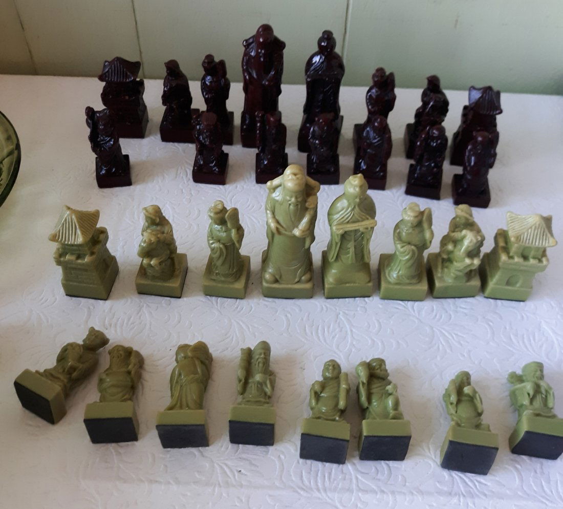jade carved chess set green & dark Ox blood?: from estate all are cold to the the touch certainly a stone jade? nephrite? very good condition missing 1 piece from the dark ox blood? see pics nice vintage set!