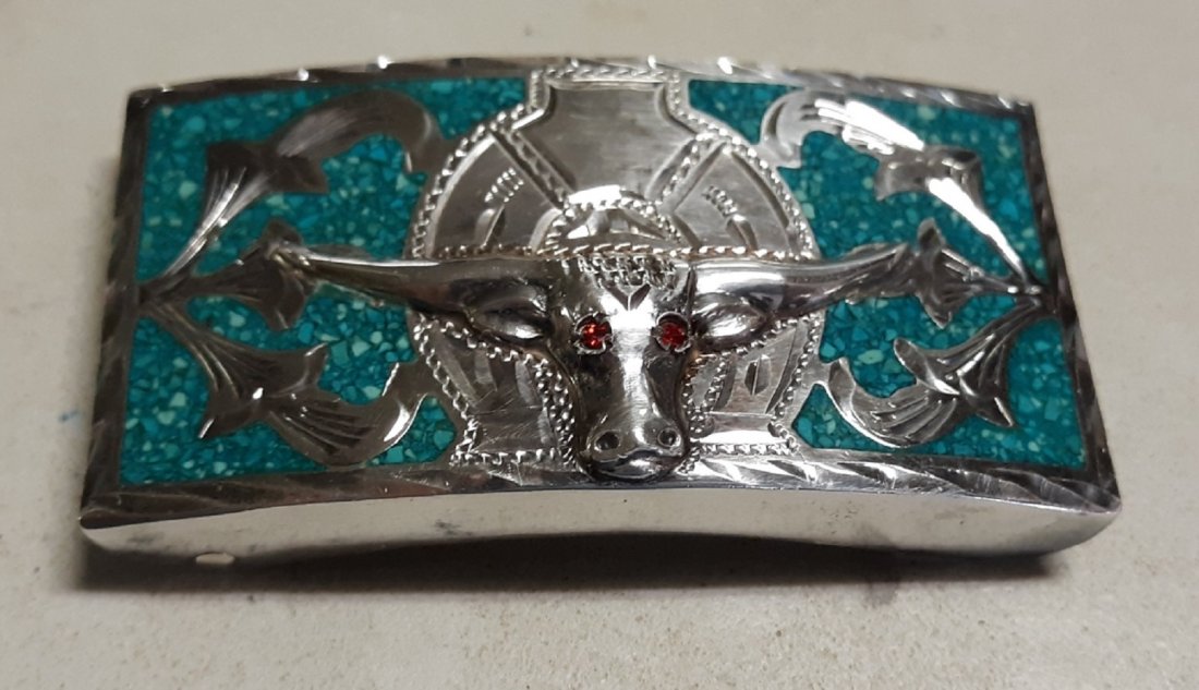 vtg sterling turquoise & ruby longhorn belt buckle: vintage 50's era sterling belt buckle with turquoise and fabulous ruby red eyes plata de jalisco 925 3" wide 1 1/2" tall and 1.5 oz but worth more than melt value! see pics
