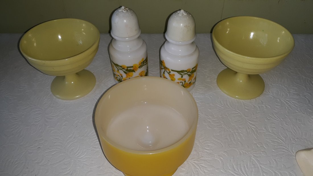 mid century lot of 5 fire king ++: mid century lot of 5 fire king ++ salt and pepper shakers, fire king f with a shield yellow custard, and two more custard not marked no damage all 5 for one bid! see pics