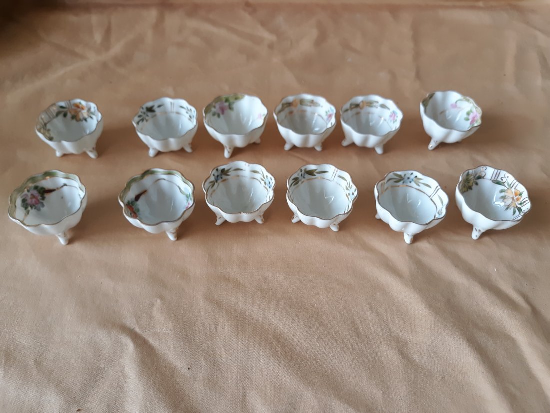 Nippon porcelain personal salts lot of 12 Rare!: from estate 12 beautiful individual salts or personal salts by Nippon light wear no major cracks or repairs noted see pics 1 1/2" x 1 1/4"