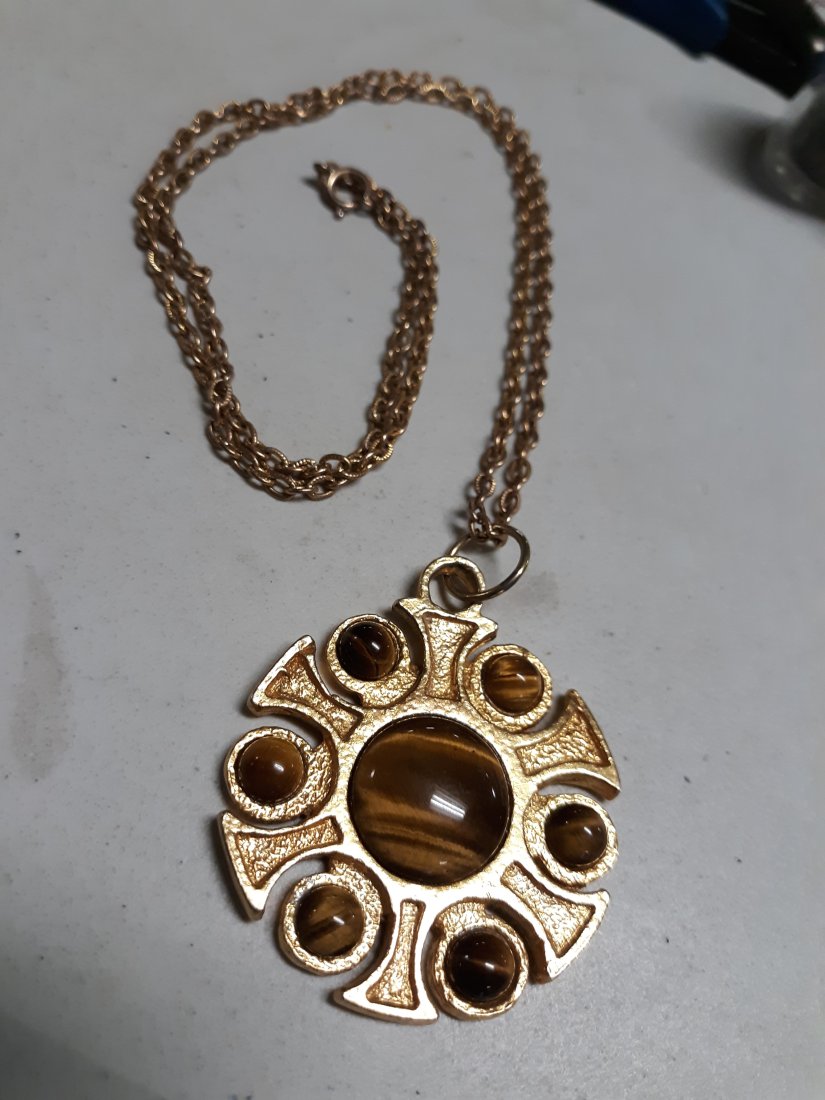 gold tone tiger eye necklace 22": from estate tiger eye cabochons set in a celtic style setting on a 22" gold tone chain see pics