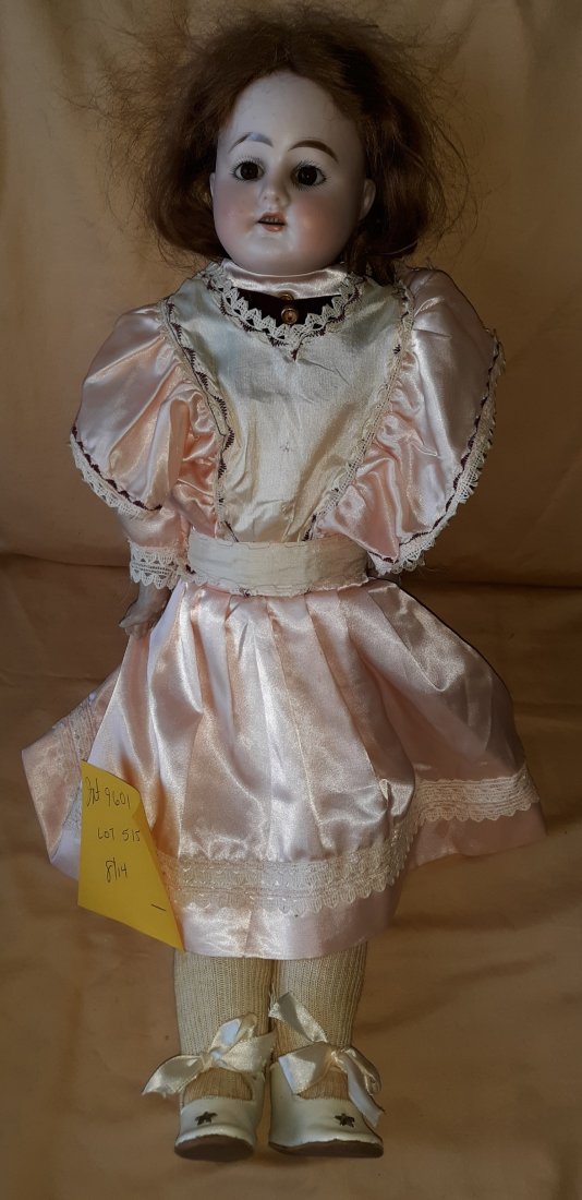 21" Antique German Bisque Heinrich Handwerck Doll: 21" Antique German Bisque Heinrich Handwerck doll marked on back neck HCH 0. H Germany condition 5 teeth, bisque head, glass eyes?, leather compo body, light loss on one finger, has clothes, face look