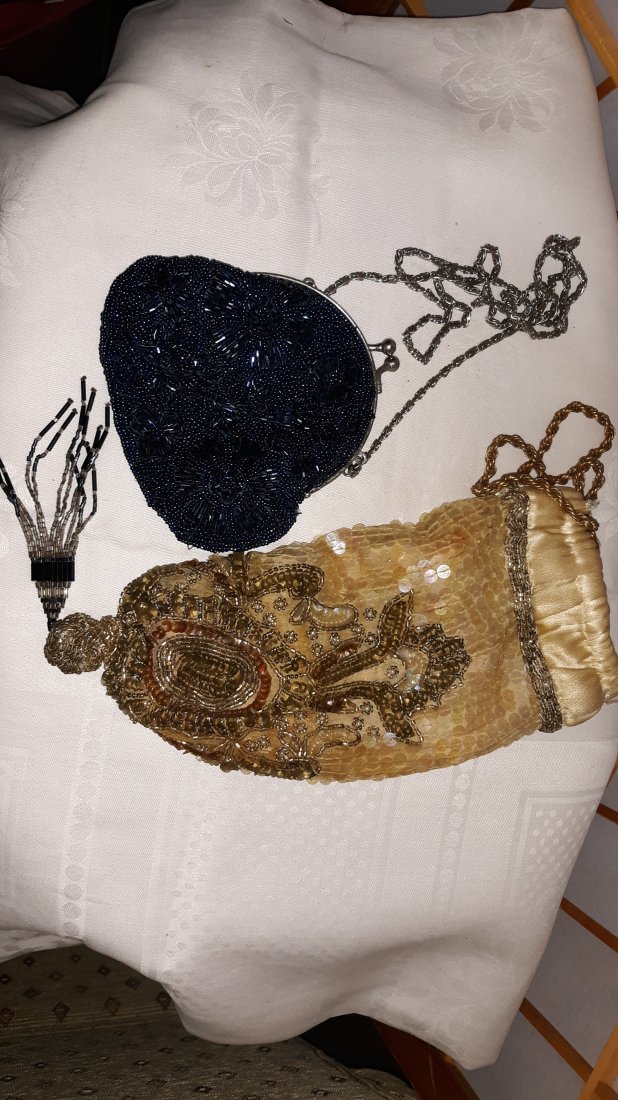 vintage beaded sequin handbags lot of 2: one is by jessica mcclintock done in electric blue, purple very pretty no damage the other one is vintage and has no name and the handle is loose, ony needs a stitch to attach. both for one bid see pi