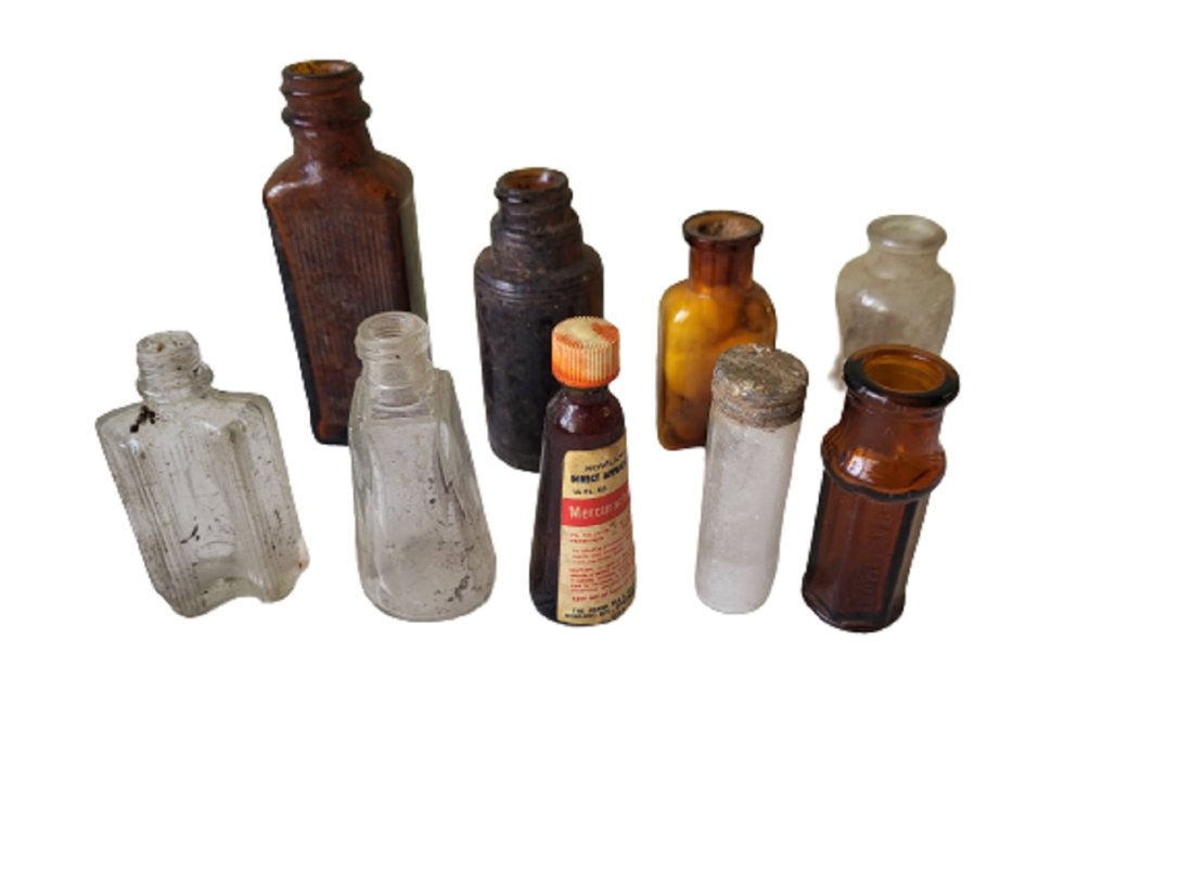antique medicine bottles lot of 9 mercurochrome and sharp: antique medicine bottles lot of 9 mercurochrome and sharp several rare and unusual bottles even a curved bottle prob 1800's era all 9 for one bid see pics