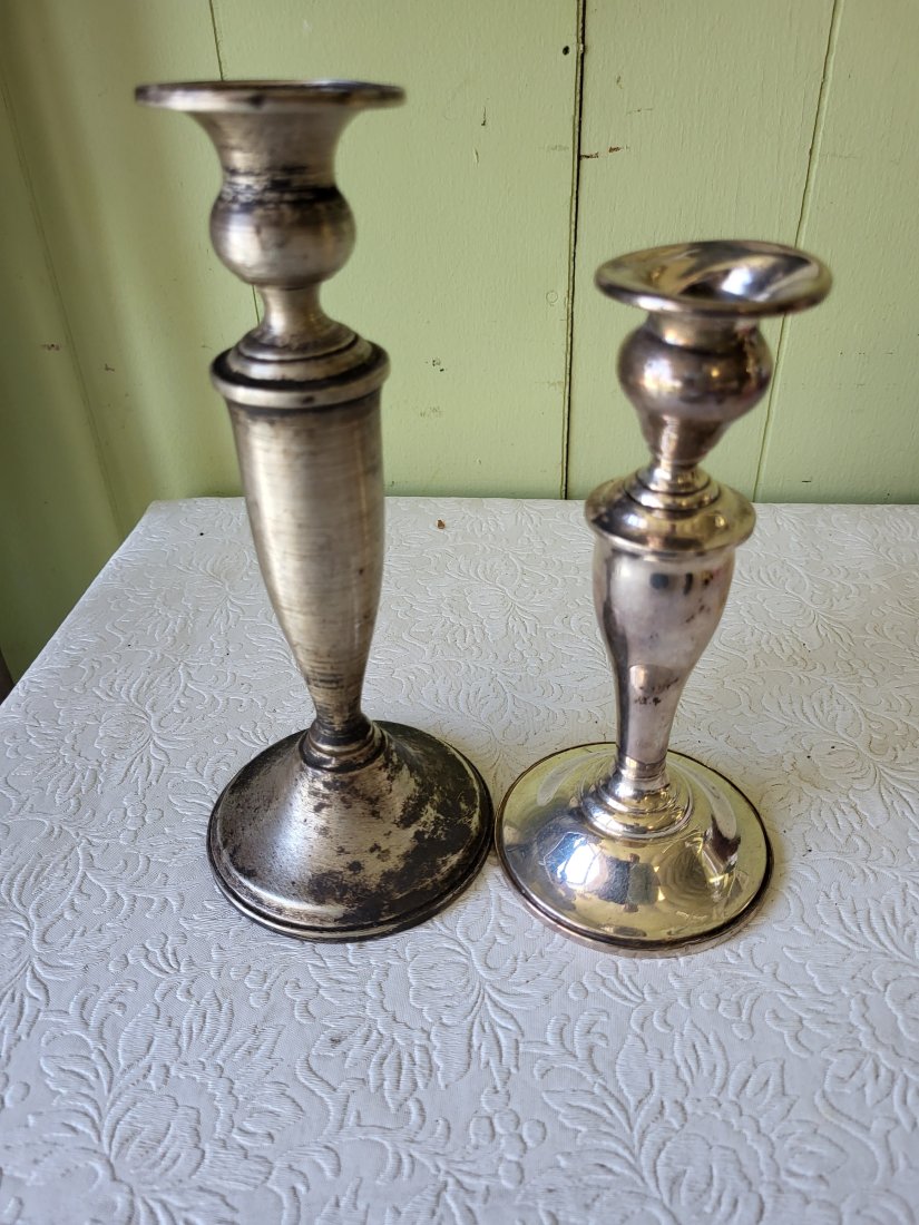 sterling candle holders larger lot of 2 scrap or use?: sterling candle holders larger lot of 2 scrap or use? shorter 1 is gorham #815 has tiwisting in top portion could be fixed? 7" tall 2nd one is 8" very scratched up 1 lb 10 oz weight see pics