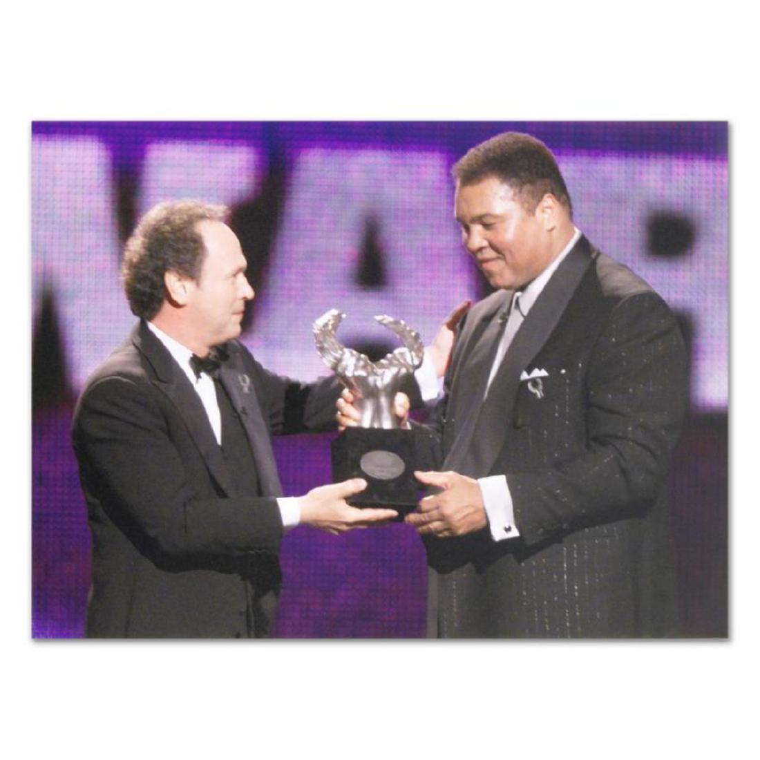 Licensed Photograph of Heavyweight Champ Muhammad: Own a piece of sports history with this Muhammad Ali photo. Taken at the peak of his fame as one of the greatest heavyweight championship boxers of all time, this photo is sure to complement any sport