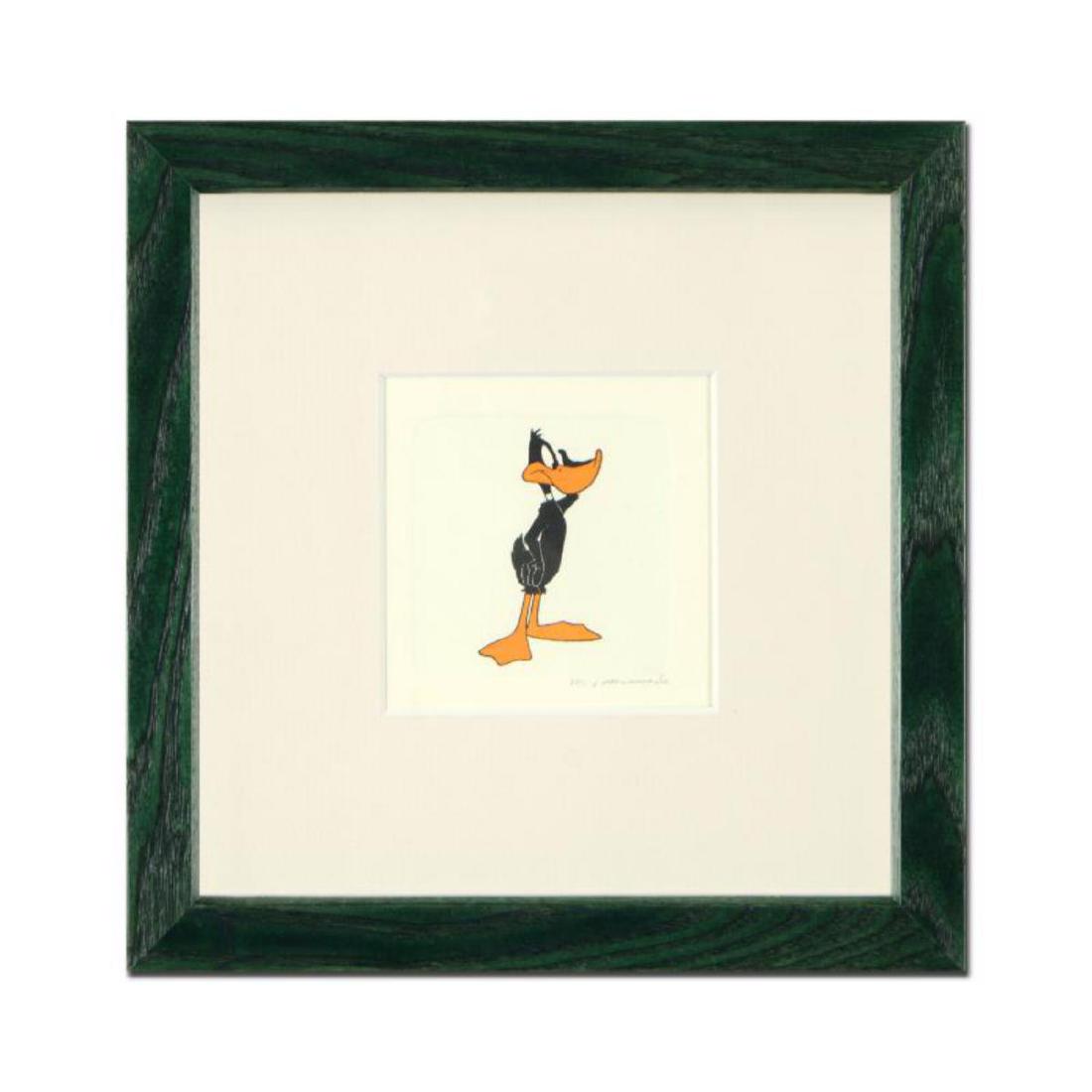 "Daffy Duck (Looking to the Side)" Framed Limited: "Daffy Duck (Looking to the Side)" is a limited edition etching on paper with hand-tinted coloring from Warner Bros, numbered and dated 1999. This piece comes framed. Measures approx. 9" x 9" (with fr