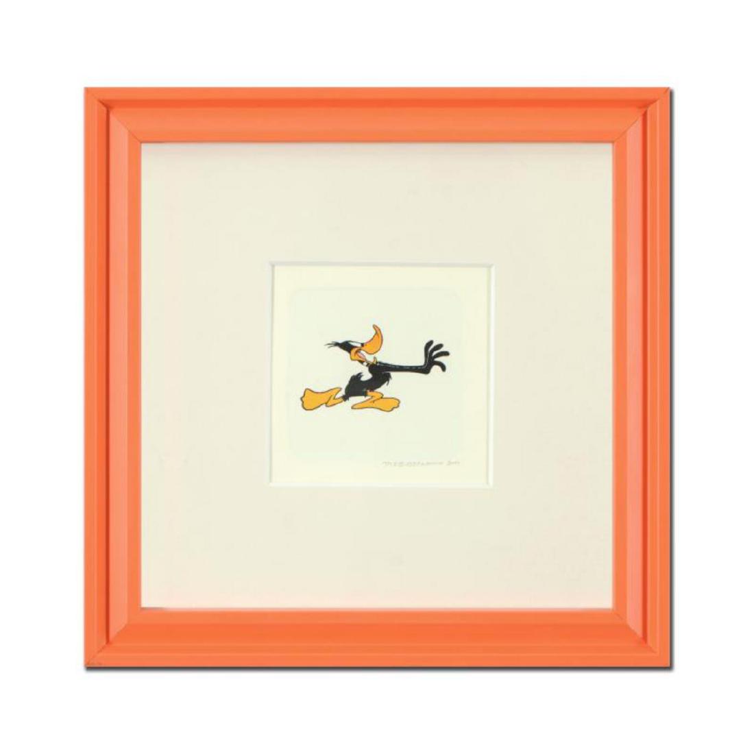 "Daffy Duck (Running)" Framed Limited Edition Etching: "Daffy Duck (Running)" is a limited edition etching on paper with hand-tinted coloring from Warner Bros, numbered and dated 1999. This piece comes framed. Measures approx. 9" x 9" (with frame), 2.5" x