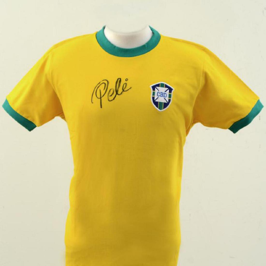 Brazil Soccer Jersey Autographed by Legendary: This is a replica Brazil soccer Jersey autographed by legendary Brazilian footballer, Pele! This piece is presented with a Letter of Authenticity from PSA/DNA, which authenticates sports memorabilia u