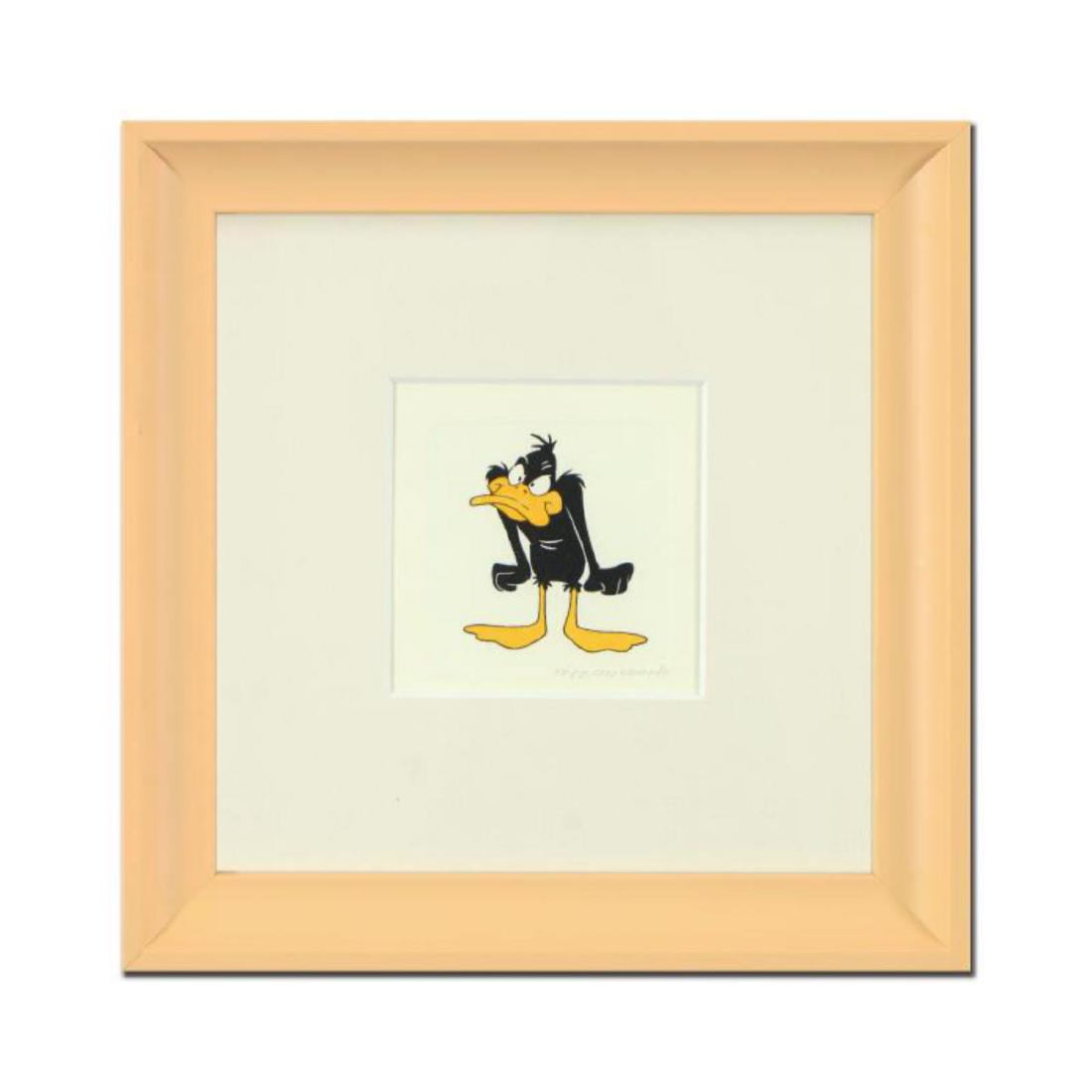 "Daffy Duck (Angry)" Framed Limited Edition Etching: "Daffy Duck (Angry)" is a limited edition etching on paper with hand-tinted coloring from Warner Bros, numbered and dated 1999. This piece comes framed. Measures approx. 9" x 9" (with frame), 2.5" x 2