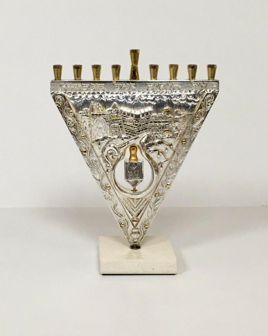 RAPHAEL ABECASSIS "MENORAH" 925 STERLING SILVER: ARTIST: REPHAEL ABECASSIS. TITLE: MENORAH. MEDIUM: 925 STERLING SILVER ON MARBLE BASE. SIZE: 12" X 10" INCHES. SIGNED: SIGNEd. CERTIFICATE OF AUTHENTICITY INCLUDED