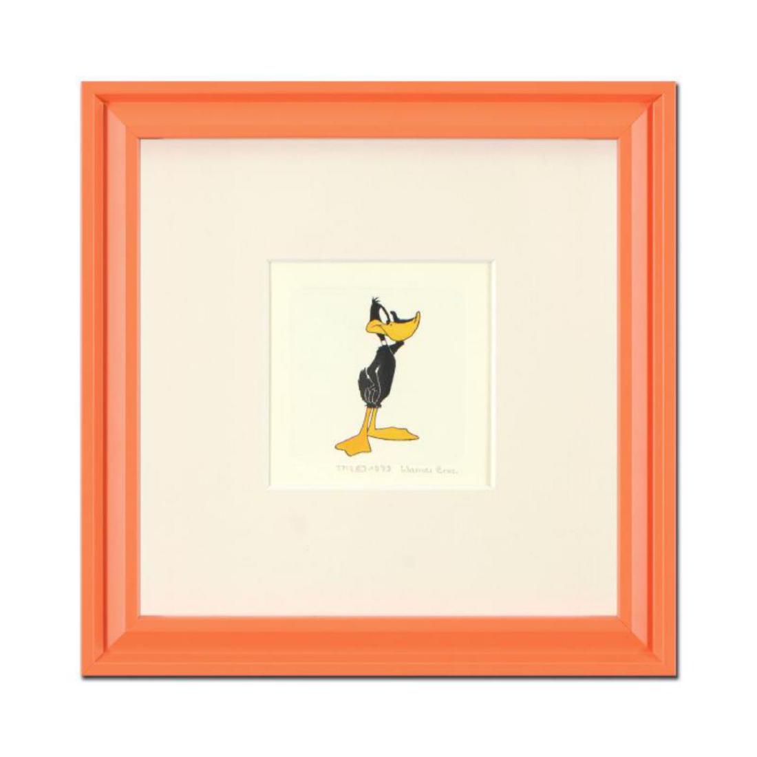 "Daffy Duck (Looking to the Side)" Framed Limited: "Daffy Duck (Looking to the Side)" is a limited edition etching on paper with hand-tinted coloring from Warner Bros, numbered and dated 1999. This piece comes framed. Measures approx. 9" x 9" (with fr