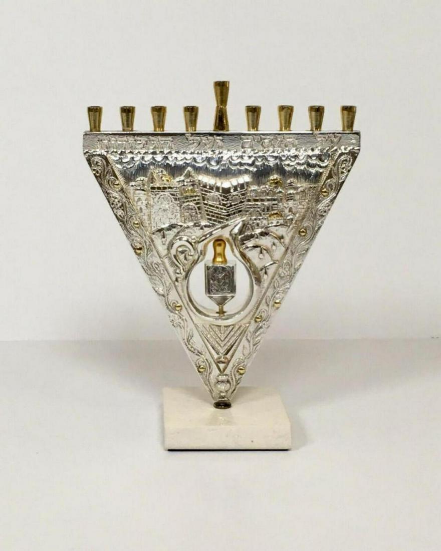 RAPHAEL ABECASSIS "MENORAH" 925 STERLING SILVER: ARTIST: REPHAEL ABECASSIS. TITLE: MENORAH. MEDIUM: 925 STERLING SILVER ON MARBLE BASE. SIZE: 12" X 10" INCHES. SIGNED: SIGNEd. CERTIFICATE OF AUTHENTICITY INCLUDED