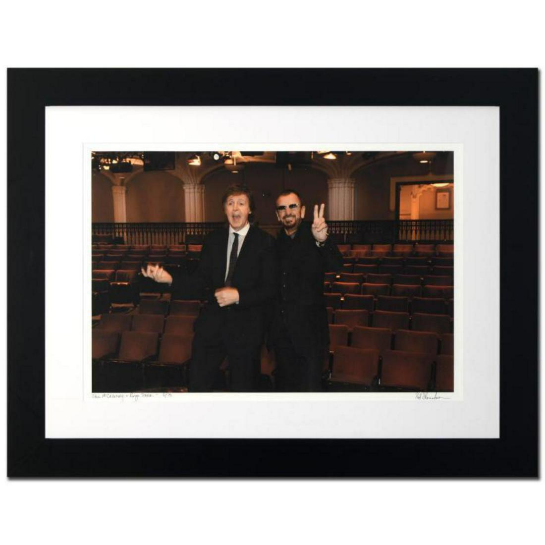 "Paul McCartney & Ringo Starr" Limited Edition Giclee: "Paul McCartney & Ringo Starr" is a limited edition giclee on paper, numbered and hand signed by acclaimed music industry photographer Rob Shanahan. This piece comes custom framed. Includes Certificat