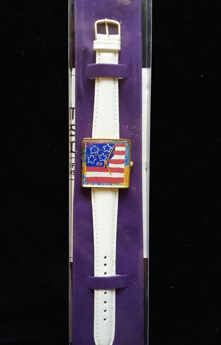 Vintage Peter Max "American Flag" Watch with Original: This is a vintage Peter Max "American Flag" wrist watch created for the Japanese market in 1991. This watch comes in the original packaging and with paperwork. Measures approx. 1.5" x 1.5" (watch face