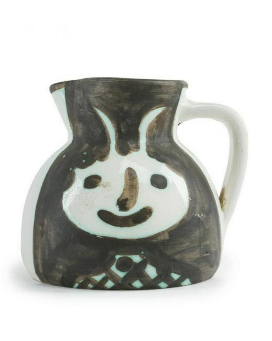 Pablo Picasso, Spanish (1881 - 1973) Ceramic Pitcher: Artist: Pablo Picasso, Spanish (1881 - 1973). Title: Tetes (Ramie 367). Year: 1956. Medium: Turned Pitcher (A.R. White Earthenware Clay, Oxidized Paraffin Decoration, White Enamel Black), stamped. Siz
