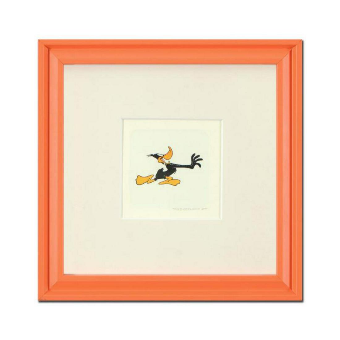 "Daffy Duck (Running)" Framed Limited Edition Etching: "Daffy Duck (Running)" is a limited edition etching on paper with hand-tinted coloring from Warner Bros, numbered and dated 1999. This piece comes framed. Measures approx. 9" x 9" (with frame), 2.5" x