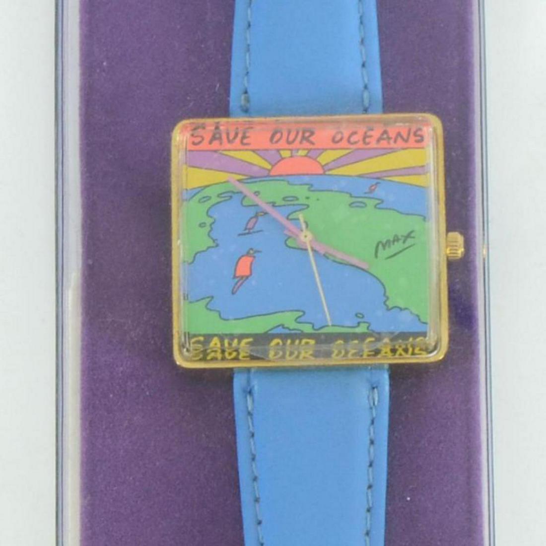 Vintage Peter Max "Save Our Oceans" Watch with Original: This is a vintage Peter Max "Save Our Oceans" wrist watch created for the Japanese market in 1991. This watch comes in the original packaging and with paperwork. Due to the age of the watch the batter