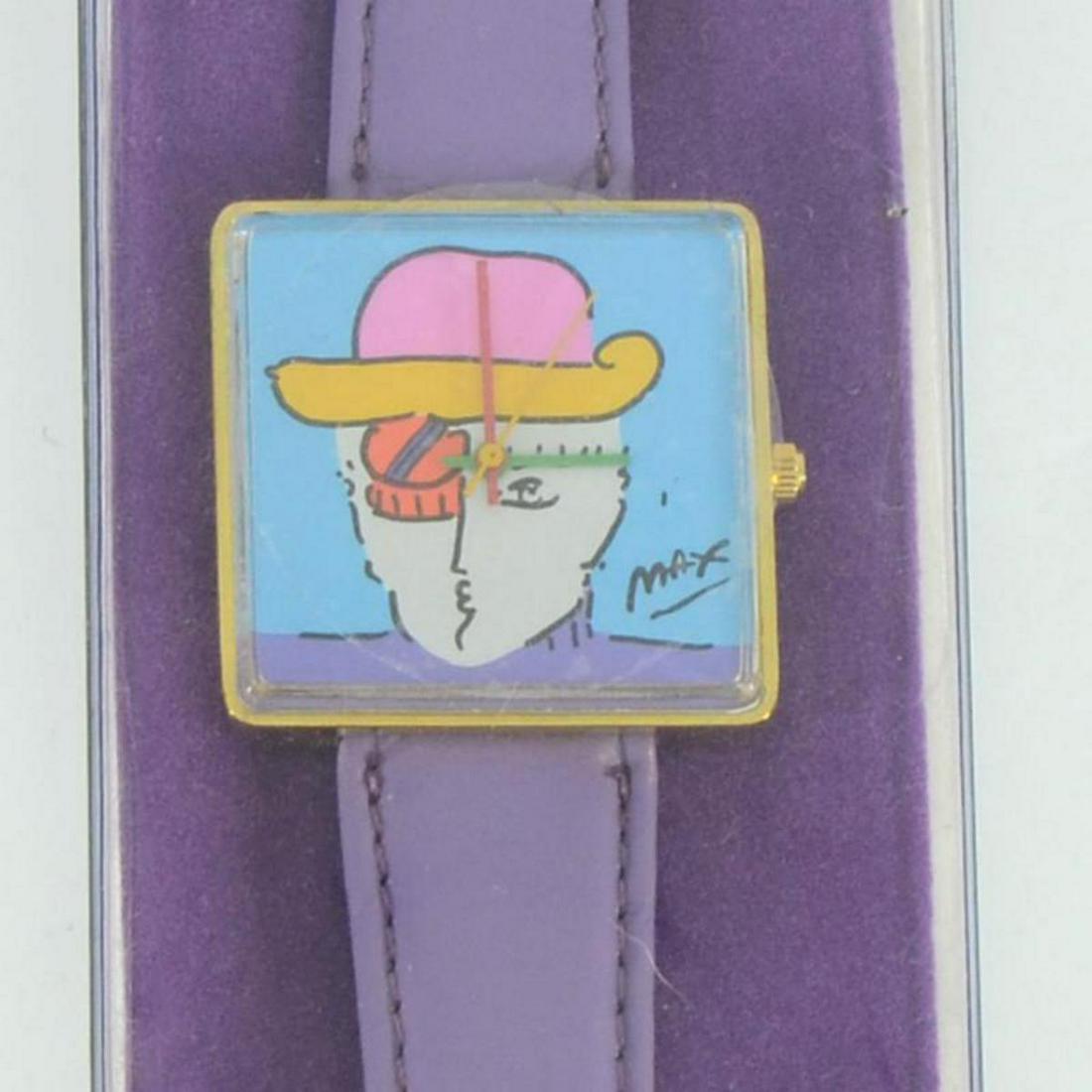 Vintage Peter Max "Face" Watch with Original Packaging: This is a vintage Peter Max "Face" wrist watch created for the Japanese market in 1991. This watch comes in the original packaging and with paperwork. Due to the age of the watch the battery will need