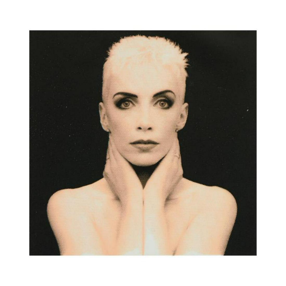 Steve Kaufman (1960-2010), "Annie Lennox" Limited: "Annie Lennox" is a limited edition silkscreen on canvas by Andy Warhol protege Steve Kaufman (1960-2010). This piece is PP numbered 6/50 and hand signed inverso. Includes Certificate of Authenticity.