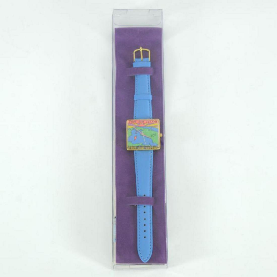 Vintage Peter Max "Save Our Oceans" Watch with Original: This is a vintage Peter Max "Save Our Oceans" wrist watch created for the Japanese market in 1991. This watch comes in the original packaging and with paperwork. Due to the age of the watch the batter