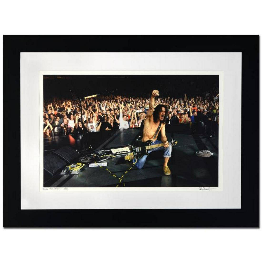 "Eddie Van Halen" Limited Edition Giclee by Rob: "Eddie Van Halen" is a limited edition giclee on paper, numbered and hand signed by acclaimed music industry photographer Rob Shanahan. This piece comes custom framed. Includes Certificate of Authenti